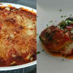 En bakad aubergine rollatini med tomatsås och ost, serverad på en vit tallrik.